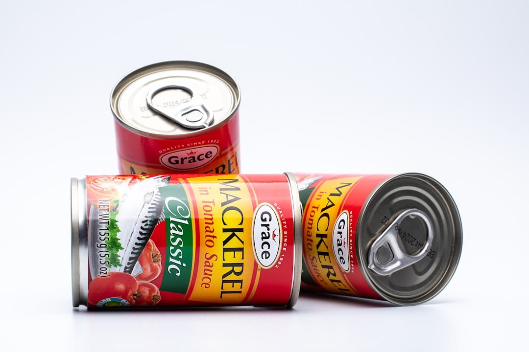 Premium cat food on plain background