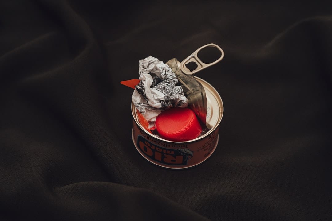 Premium wet cat food on plain background
